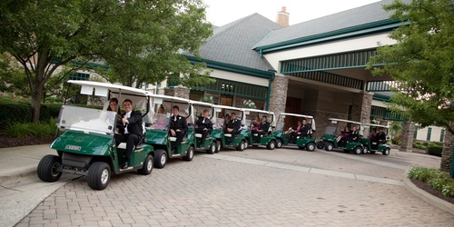 IMG_bridal party in golf carts in front of the building.jpg